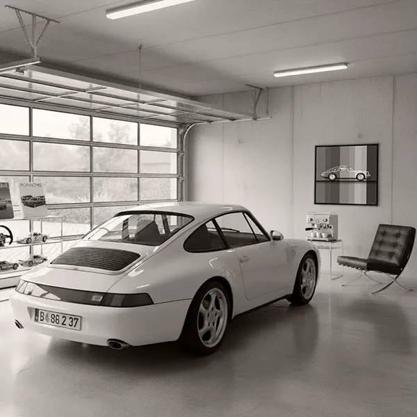 Classic Porsche 911 parked in a clean, light-filled private garage, highlighting the calm and intentional space many owners create.