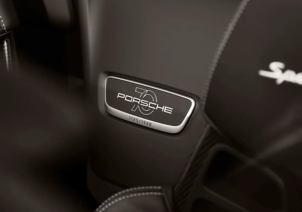 Numbered Porsche interior detail showing how limitation becomes meaningful when it reflects intent rather than exclusivity.